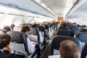 Passengers are on an aircraft.