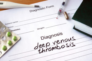 A diagnostic form with the words 'deep vein thrombosis' written on the document