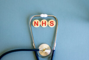 A stethoscope with NHS above it 