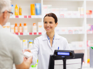 A pharmacist is dispensing medication 